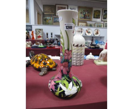 A Moorcroft Pottery Vase, painted in the Wild Gladioli pattern, signed by the designer Nicola Slaney, limited edition No. 44/