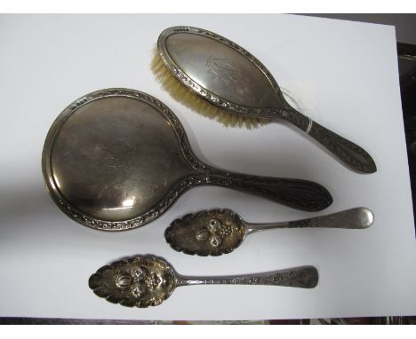 A Hallmarked Silver Berry Spoon, later decorated); another example (marks worn); a hallmarked silver backed hand mirror and m