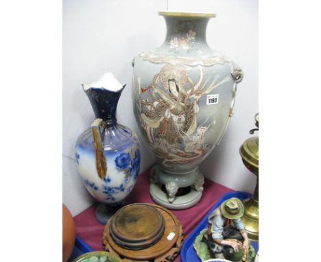 A Satsuma Pottery Vase, featuring Fighting Warriors and Geisha Girl, on grey ground 53.5cm high. Continental blue and white v