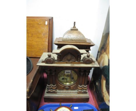 An Early XX Century Mahogany Mantel Clock, arched and shell carved pediment, twin fluted half columns on plinth base, and a f