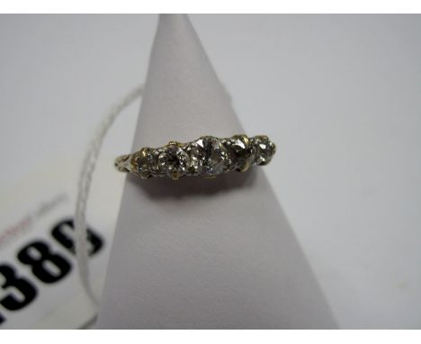 A Five Stone Diamond Ring, graduated claw set with old cut stones, stamped "18".