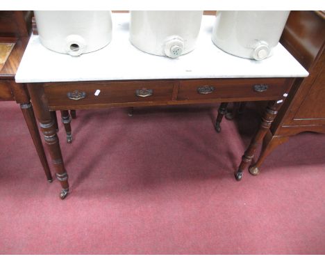 An Edwardian Walnut Washstand, with blue and white six tile back marble top, twin drawers, on turned legs.