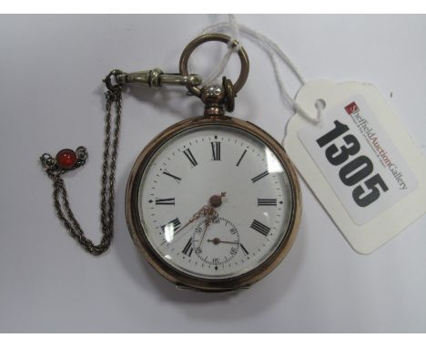An Openface Pocketwatch, the unsigned white dial with Roman numerals and seconds subsidiary dial, within engine turned case s