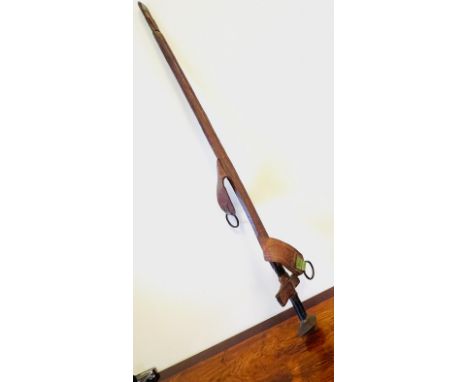 LONG SWORD, PROBABLY NIGERIAN WITHIN DECORATIVE LEATHER SCABBARD, APPROX 99cm LONG.  UNABLE TO RELEASE SCABBARD, CLIENT INFOR