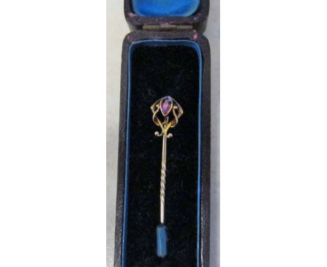 15ct gold stick pin with garnet stone total weight