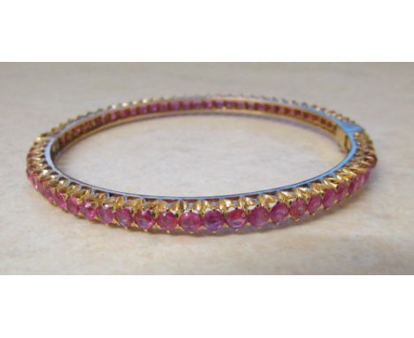 18ct gold 6 ct total pink ruby bangle weight 16.4 g