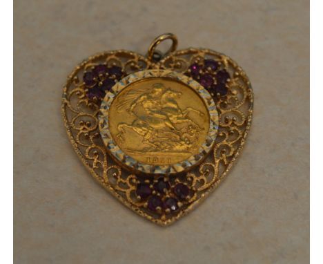 1911 22ct gold full sovereign mounted in a 9ct gold heart shaped pendant with synthetic ruby stones, total approx weight 16.3