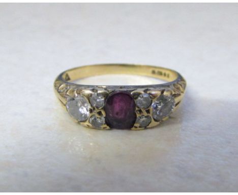 9ct gold ruby and diamond ring (diamond total 0.40 ct) size I