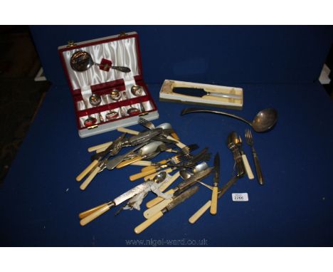 A quantity of assorted plated Cutlery, a ladle, boxed fruit set, and boxed Pie and tart server.