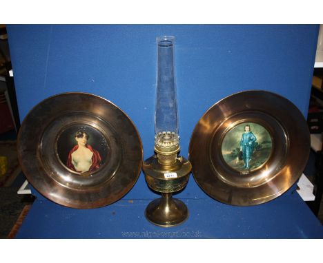 A pair of 'Trafford Plaques' series no.1 Old Masters 'The Blue Boy' and 'Mrs Scott Moncrief' and a Brass Oil Lamp