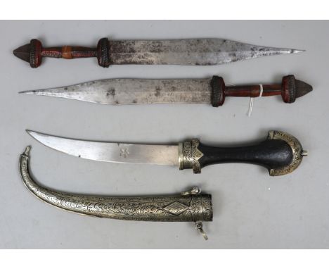 2 Central Sahara Chad 'tebu' tribal daggers with plaited leather handles, plus Moroccan jambhiya in white metal scabbard 