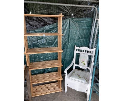 A pine slatted shelf unit and painted storage chair