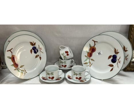 A quantity of Royal Worcester Evesham vale dinner plates, cups &amp; saucers