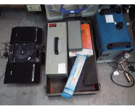 Mixed tools to include a portable airbrush spray booth, rotary tool kit, belt clamp, and similar. A HHO generator / welder. A