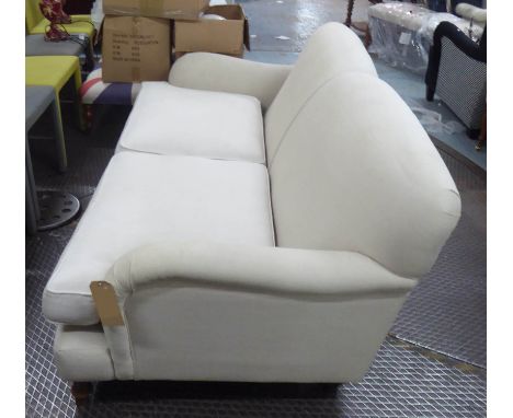 SOFA, Howard style, two seater, with neutral upholstery on short turned front feet, 187cm L x 84cm H. (with faults to upholst