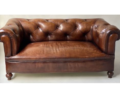 CHESTERFIELD SOFA, Victorian faded tobacco brown buttoned leather back and arms with turned front supports, 166cm W. 