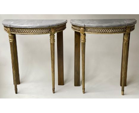 CONSOLE TABLES, a pair, Louis XVI style giltwood, each demilune, with marble top and pierced frieze, 73cm W x 70cm D x 82cm H