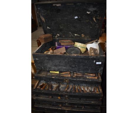 A vintage tool chest containing woodworking chisels and carving tools etc