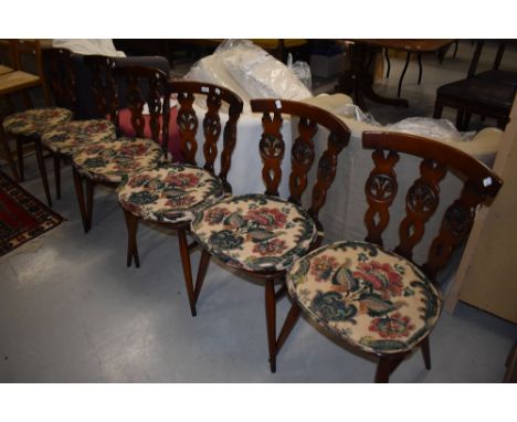 A set of six 'Fleur de Lys' style ercol kitchen dining chairs dark stained