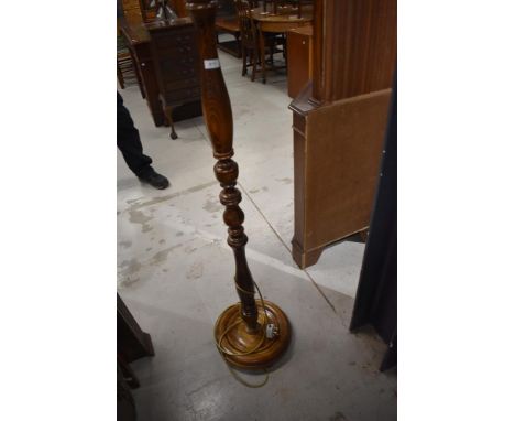 A traditional stained frame standard lamp