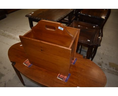 A vintage pine magazine trough