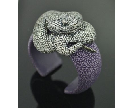 A purple dyed shagreen silver and crystal set bangle in the form of a rattlesnake, stamped "925" to back