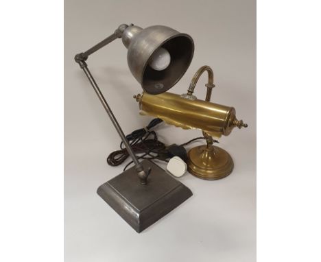 A brass student's lamp, another adjustable metal lamp, barley-twist brass table lamp, a blue and white baluster shaped table 