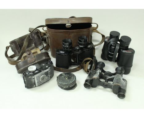 A box containing various binoculars including Carl Zeiss Deltrintem 8 x 30, a pair of Tasco, another vintage pair, eight day 