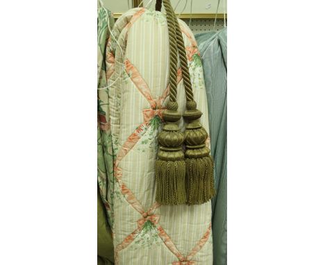 A set of four metal wrapped tassel tie backs together with a pair of curtains, further tie backs, a quilt, the stripped groun
