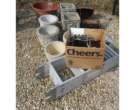 A pair of Cotswold Studios Limited barrel type garden urns and two further pairs of garden urns, a terracotta pot, a Qualcast