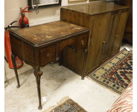 A pine two-door cupboard and walnut writing table, together with a child's pine settle (converted to shelf unit)