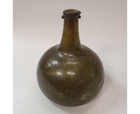 A late 17th Century green glass onion shaped wine bottle  CONDITION REPORTS Numerous surface scratches, scuffs, internal and 