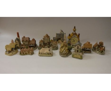 A collection of 22 various cottage ornaments by David Winter, Malcolm Cooper and Jon Herbert, together with a Canon Motor Zoo