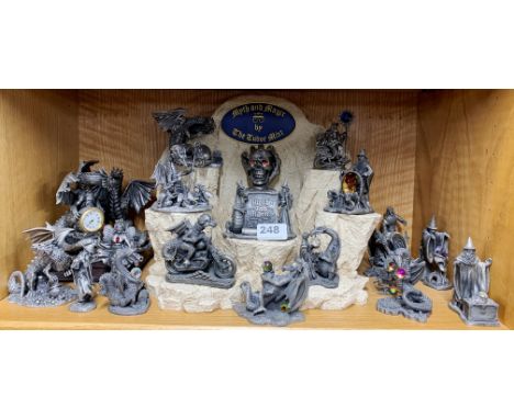 An extensive group of Myth and Magic figurines with stand.