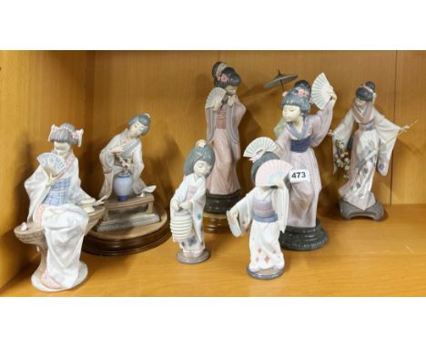 A group of eight Lladro figures of Japanese girls.