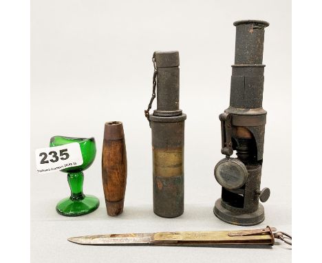 A 19thC portable microscope and three further items, including a wooden cased skinning blade. Microscope H. 16cm.