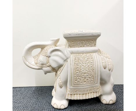 A Chinese ceramic elephant stool, H. 44cm.