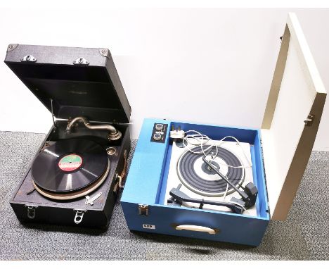 A vintage portable record player and a portable wind up record player.