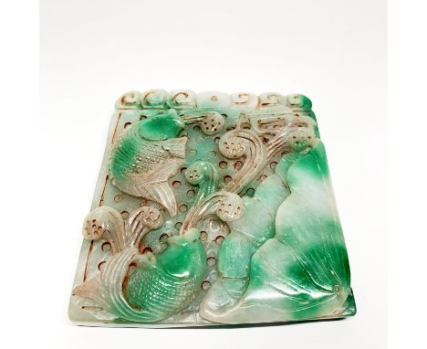 A Chinese carved jade/ hardstone fish and lotus amulet, size 8.5 x 8.5cm. Prov Jean Rich collection.