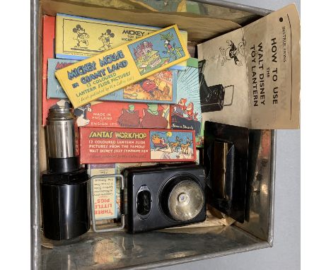 An early Disney toy lantern and slides.