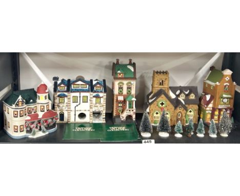 A group of eight Heritage Village collection ceramic buildings, tallest 25cm.