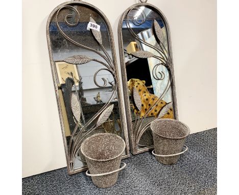 A pair of metal wall mounted garden mirror plant pot holders, H. 57cm.