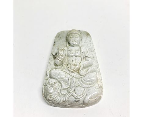 A Chinese carved stone Buddha amulet, H. 7cm.