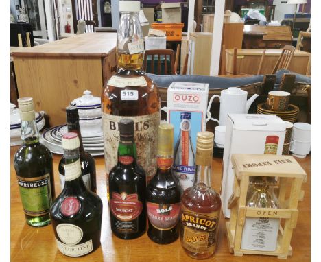 A vintage eight pint bottle of Bell's whiskey and a quantity of liqueurs.
