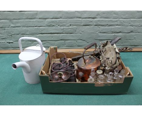 A box of mixed metalwares including seamed copper kettles, an enamel watering can, a vintage Bakelite hot water bottle etc