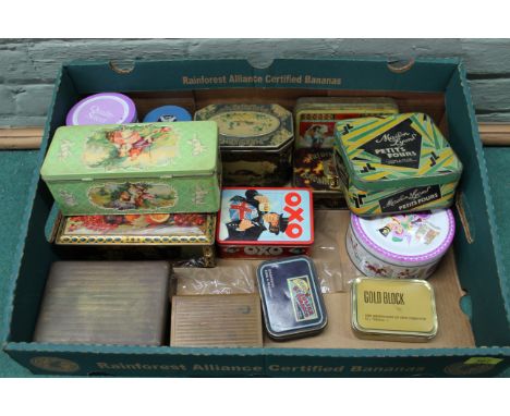 A box of vintage advertising tins