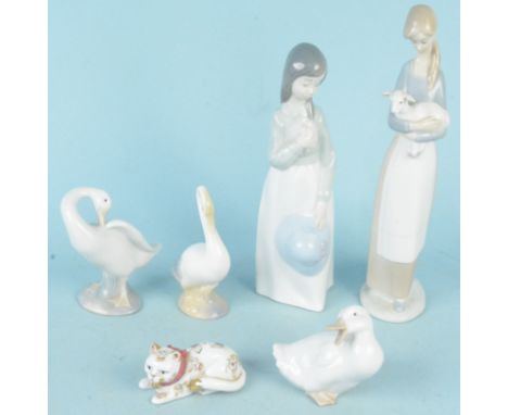 A Lladro and a Nao figurine of girls, a Lladro and Nao duck plus one other and a Franklin Mint cat