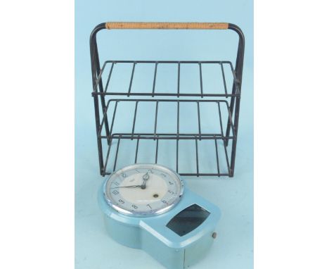 A vintage Smiths Enfield blue painted metal drop dial wall clock plus a metal three tier rack