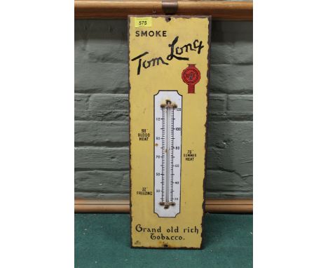 A vintage enamel on metal advertising sign for 'Tom Long Tobacco' with thermometer