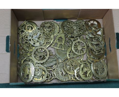 A large collection of vintage horse brasses